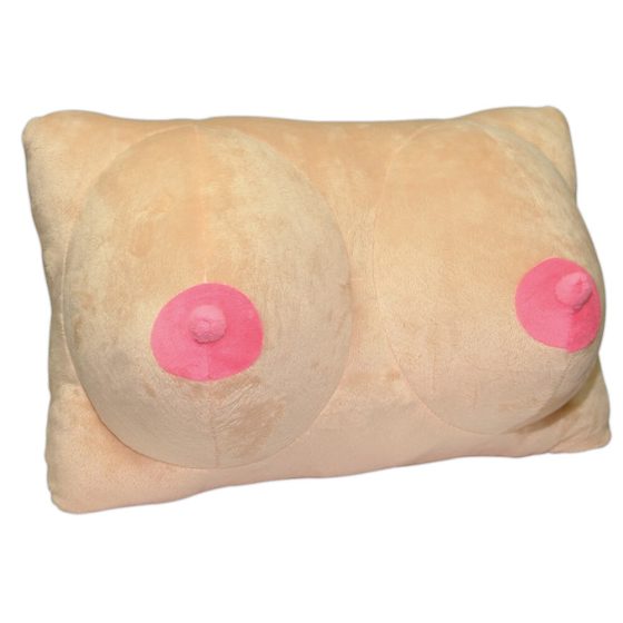 Plush cushion in the shape of a breast